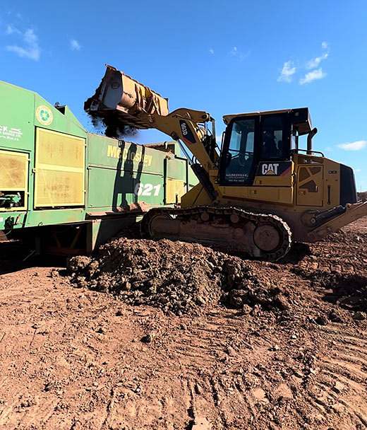 Photo of a dozer at an excavation services project