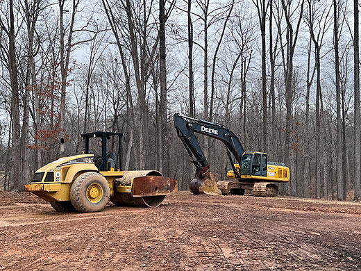 Photo of land clearing equipment at a site preparation project